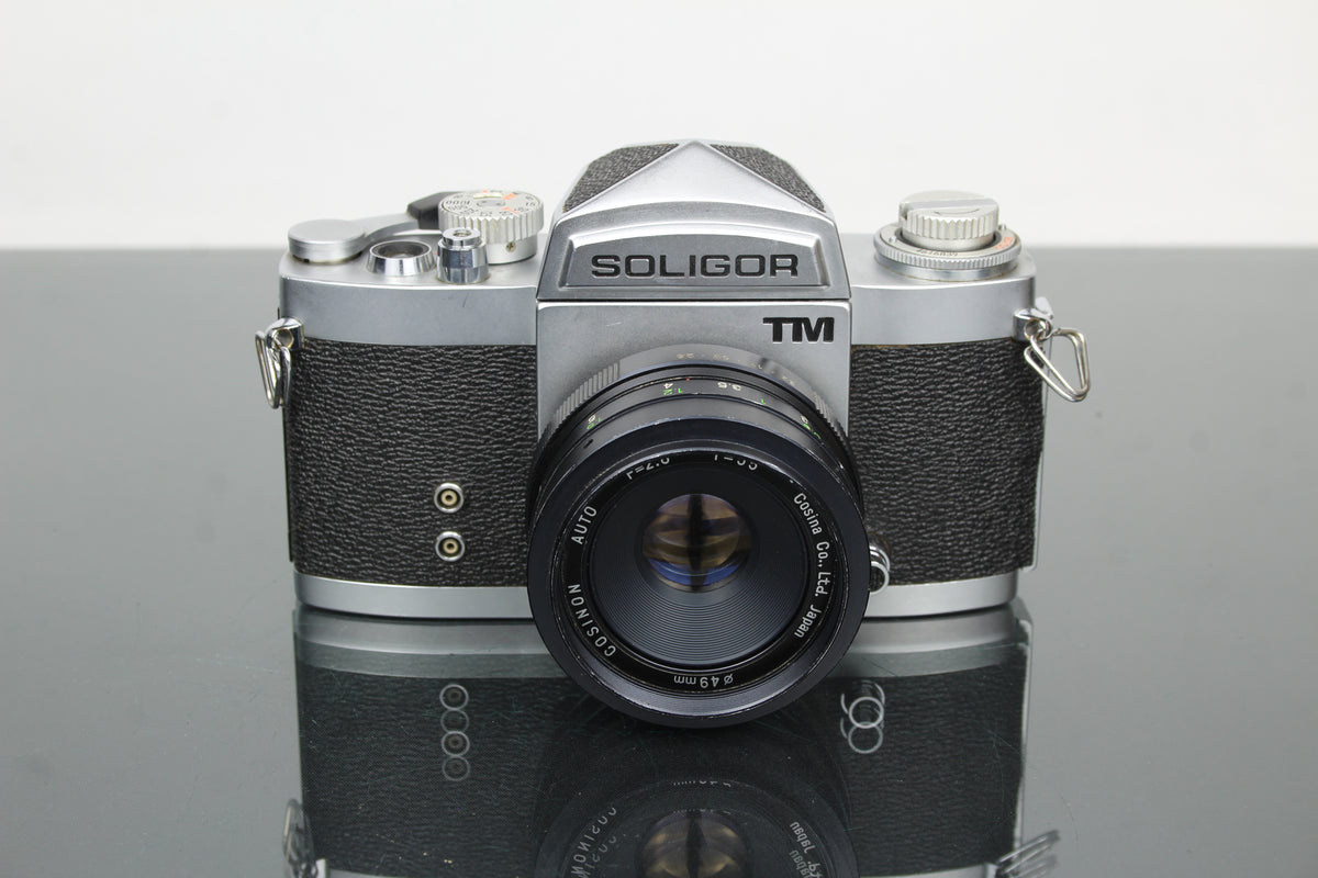 Soligor TM + Cosinon Auto 55mm f/2.8 Linse